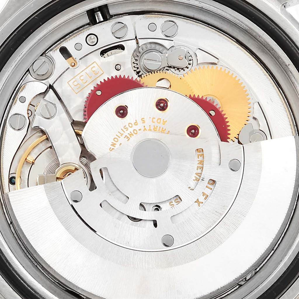 This image shows the movement and internal components of a Rolex Submariner 16610LV Men
s Stainless Steel Black Dial 16610LV Men
s Stainless Steel Black Dial watch from a close-up angle.