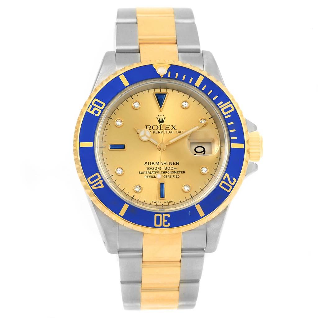 The Rolex Submariner 16613 Men
s Steel and Gold (two tone) Champagne Dial 16613 Men
s Steel and Gold (two tone) Champagne Dial watch is shown from a top-down angle, displaying the face, bezel, and bracelet.
