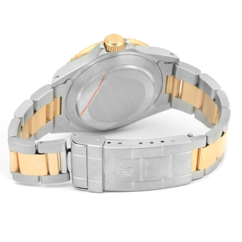 The image shows the back view of a Rolex Submariner 16613 Men
s Steel and Gold (two tone) Grey Dial 16613 Men
s Steel and Gold (two tone) Grey Dial watch, highlighting the bracelet, clasp, and case back.