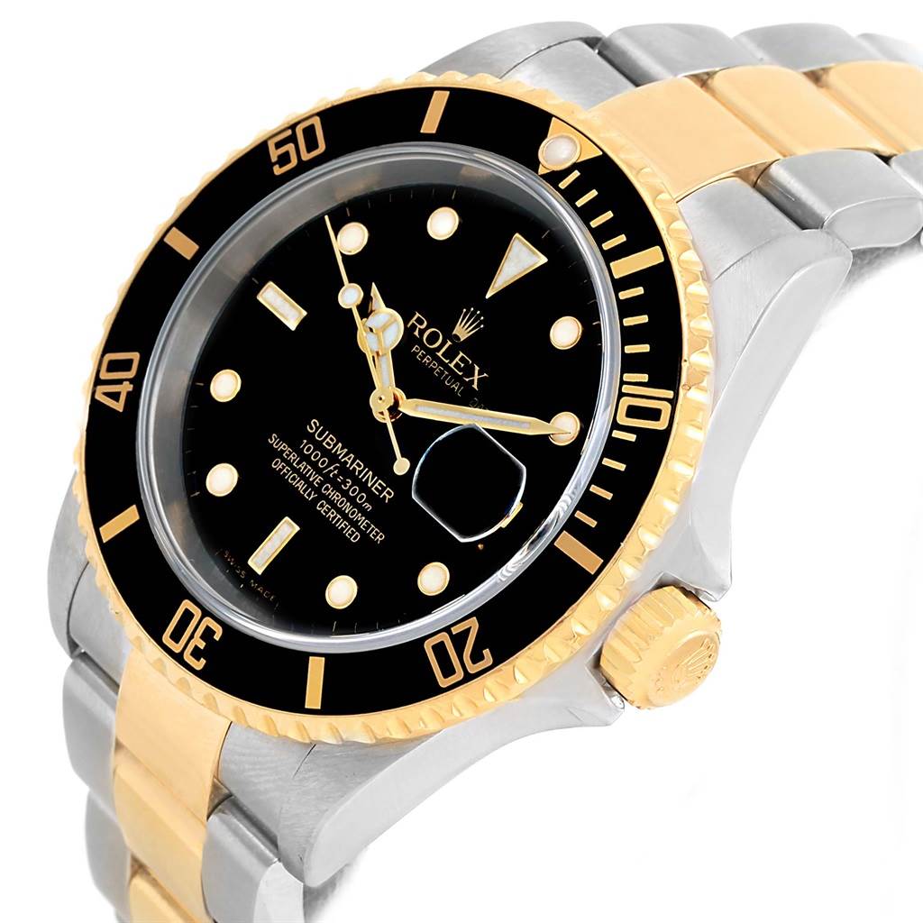 The Rolex Submariner 16613 Men
s Steel and Gold (two tone) Black Dial 16613 Men
s Steel and Gold (two tone) Black Dial watch is shown at a slight angle, displaying its black dial, gold accents, bezel, and two-tone bracelet.