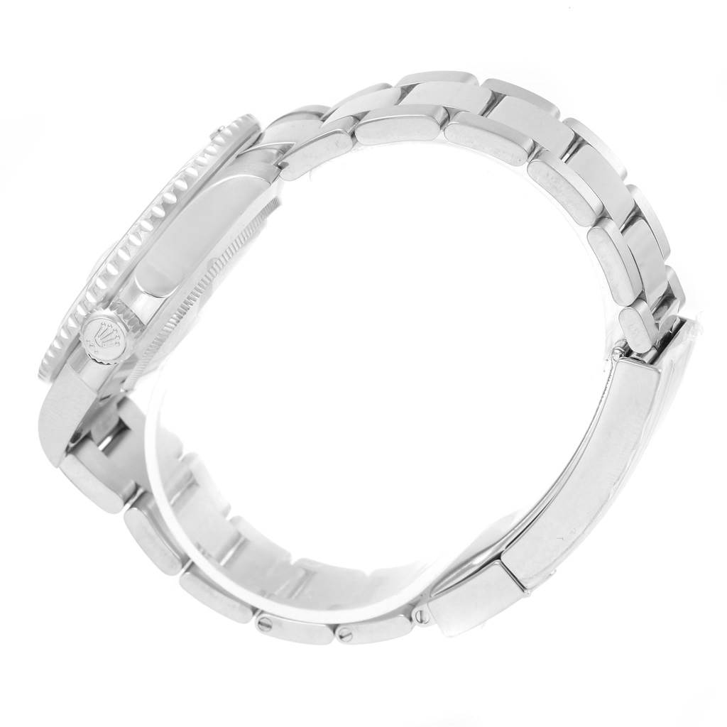 The image shows a side view of a Rolex Submariner 116619LB Men's White Gold Blue Dial 116619LB Men's White Gold Blue Dial watch, highlighting its bracelet, clasp, and part of the case.