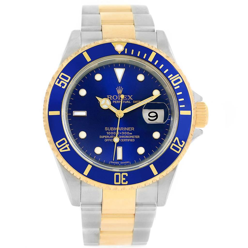 The image shows a front view of a Rolex Submariner 16613 Men
s Steel and Gold (two tone) Blue Dial 16613 Men
s Steel and Gold (two tone) Blue Dial watch, featuring a blue dial, two-tone metal bracelet, and date display.
