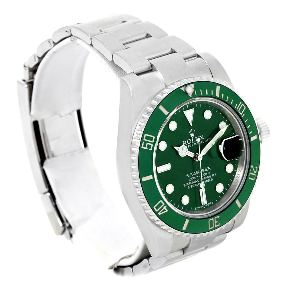The image shows a Rolex Submariner 116610LV Men
s Stainless Steel Green Dial 116610LV Men
s Stainless Steel Green Dial watch at a tilted angle, displaying the green dial, bezel, and part of the stainless steel bracelet.