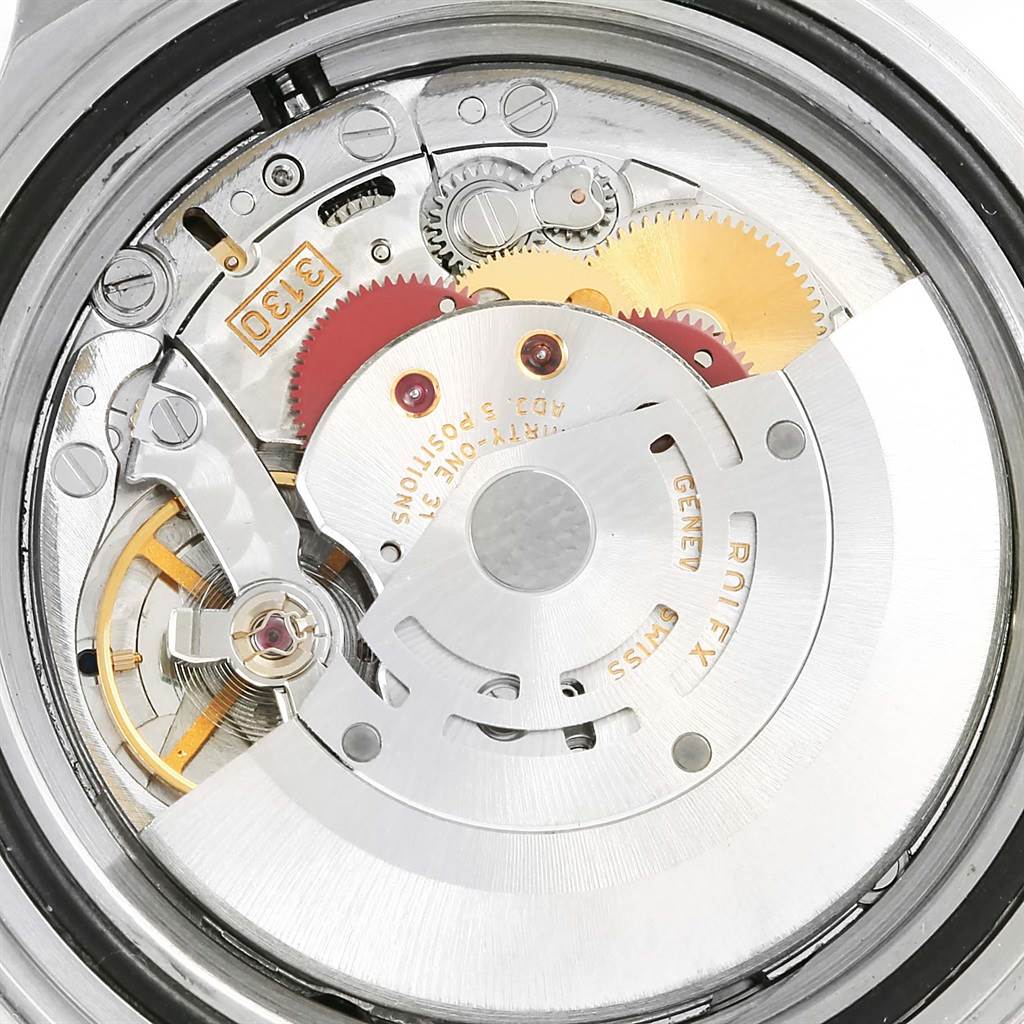 This image shows the internal mechanism of a Rolex Submariner 14060 Men
s Stainless Steel Black Dial 14060 Men
s Stainless Steel Black Dial watch, focusing on the movement components.