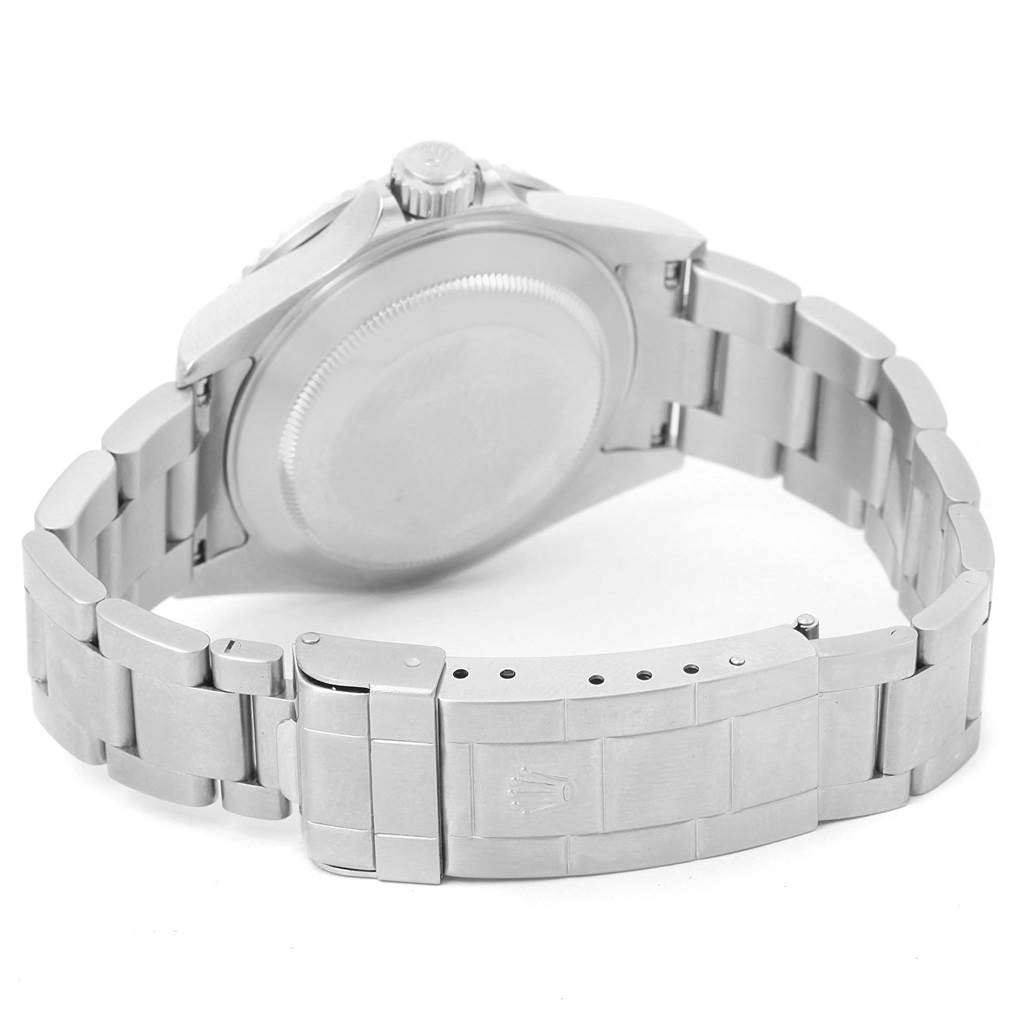 This image shows the back case, crown, and stainless steel bracelet of a Rolex Submariner 16610LV Men
s Stainless Steel Black Dial 16610LV Men
s Stainless Steel Black Dial watch from an angle.