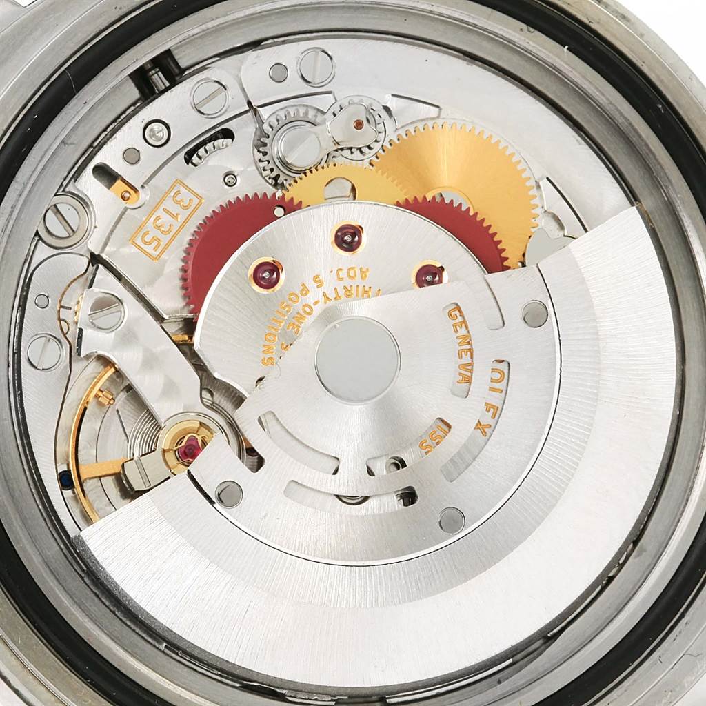 This image shows the internal mechanical movement of a Rolex Submariner 16610LV Men
s Stainless Steel Black Dial 16610LV Men
s Stainless Steel Black Dial watch.