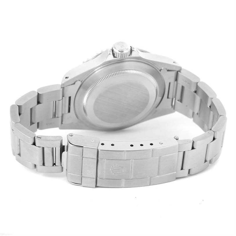 This image shows the back view of a Rolex Submariner 14060 Men
s Stainless Steel Black Dial 14060 Men
s Stainless Steel Black Dial watch, highlighting its case back and bracelet clasp.