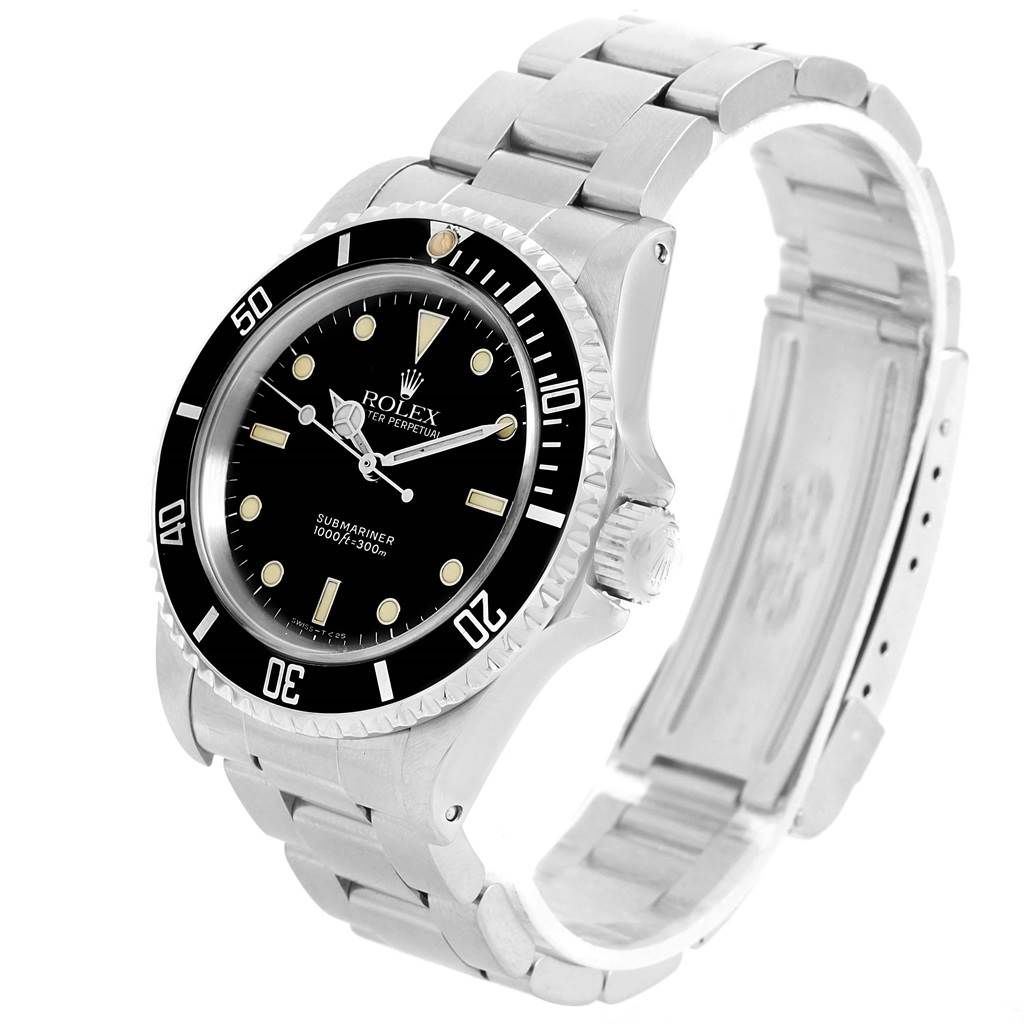 This image shows a Rolex Submariner 14060 Men
s Stainless Steel Black Dial 14060 Men
s Stainless Steel Black Dial watch at an angled view highlighting its face, bezel, crown, and part of its metal bracelet.