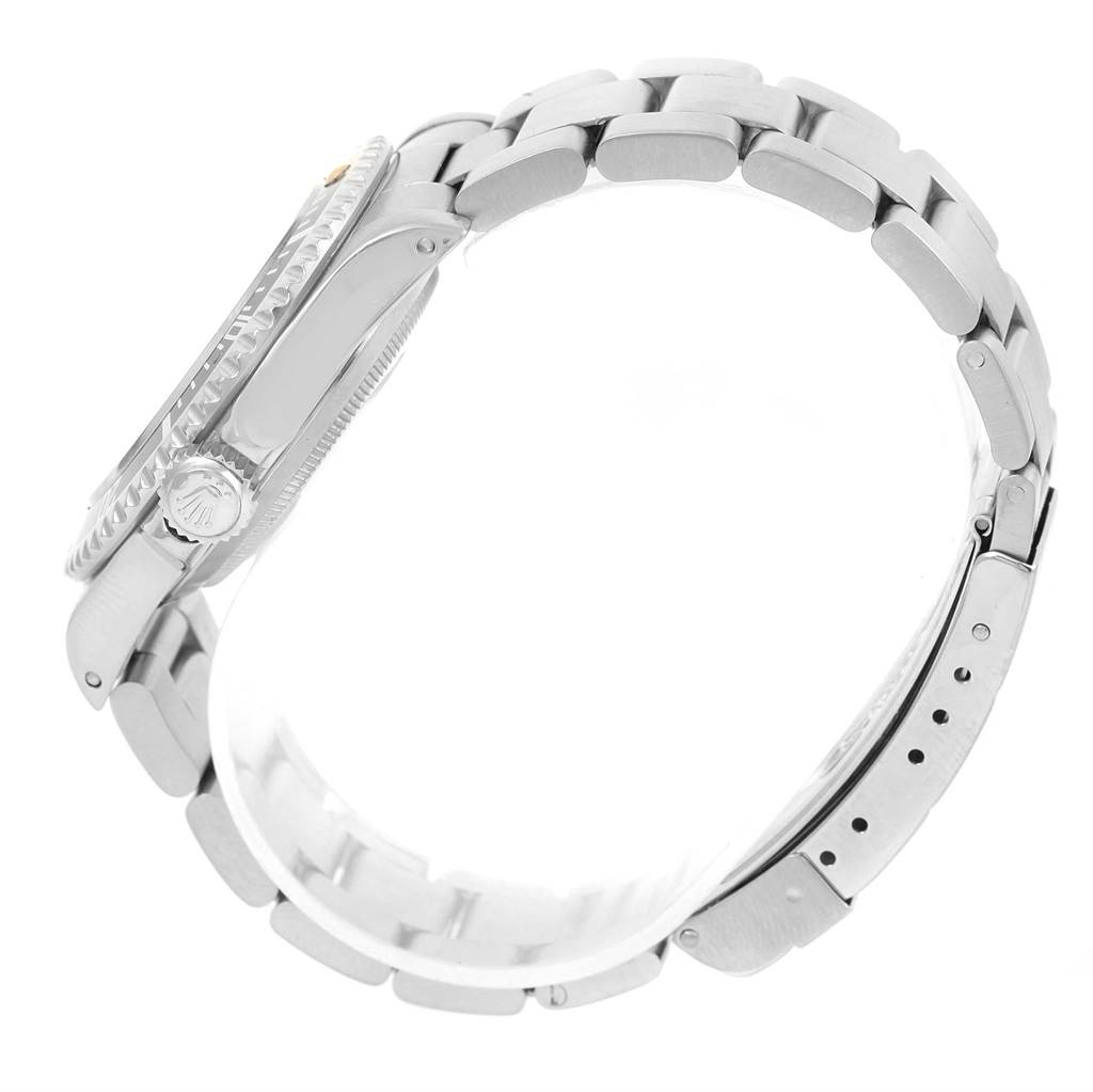 The image shows a side view of a Rolex Submariner 14060 Men
s Stainless Steel Black Dial 14060 Men
s Stainless Steel Black Dial watch, highlighting the bracelet, clasp, and crown.