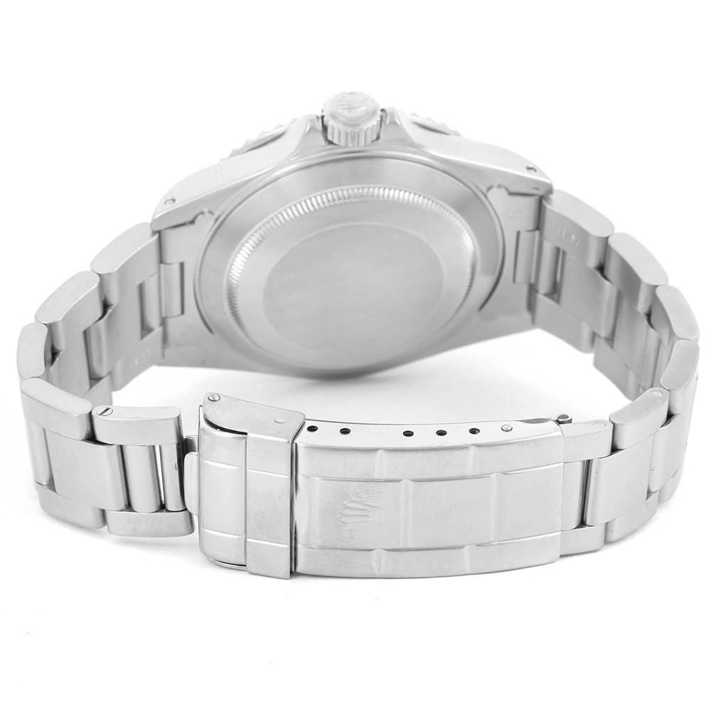 The image shows the back view of a Rolex Submariner 14060 Men
s Stainless Steel Black Dial 14060 Men
s Stainless Steel Black Dial watch, highlighting the case back, bracelet, and clasp.