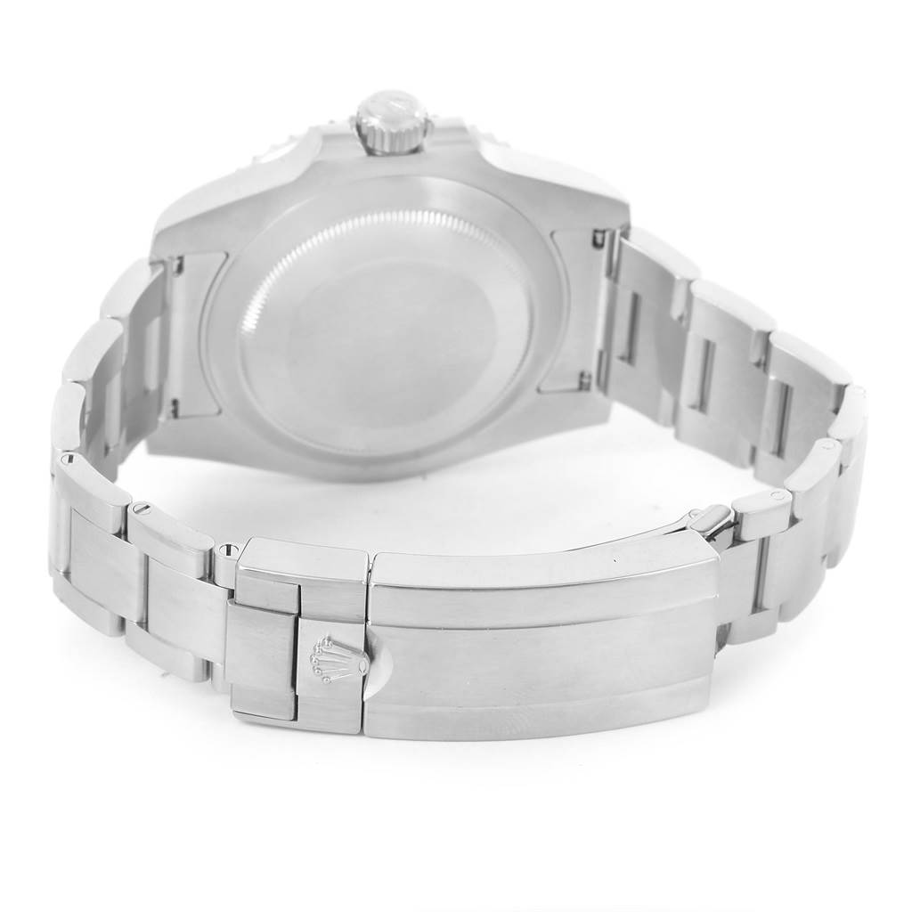 The image shows the back of a Rolex Submariner 114060 Men
s Stainless Steel Black Dial 114060 Men
s Stainless Steel Black Dial watch, highlighting the case back and the bracelet clasp.