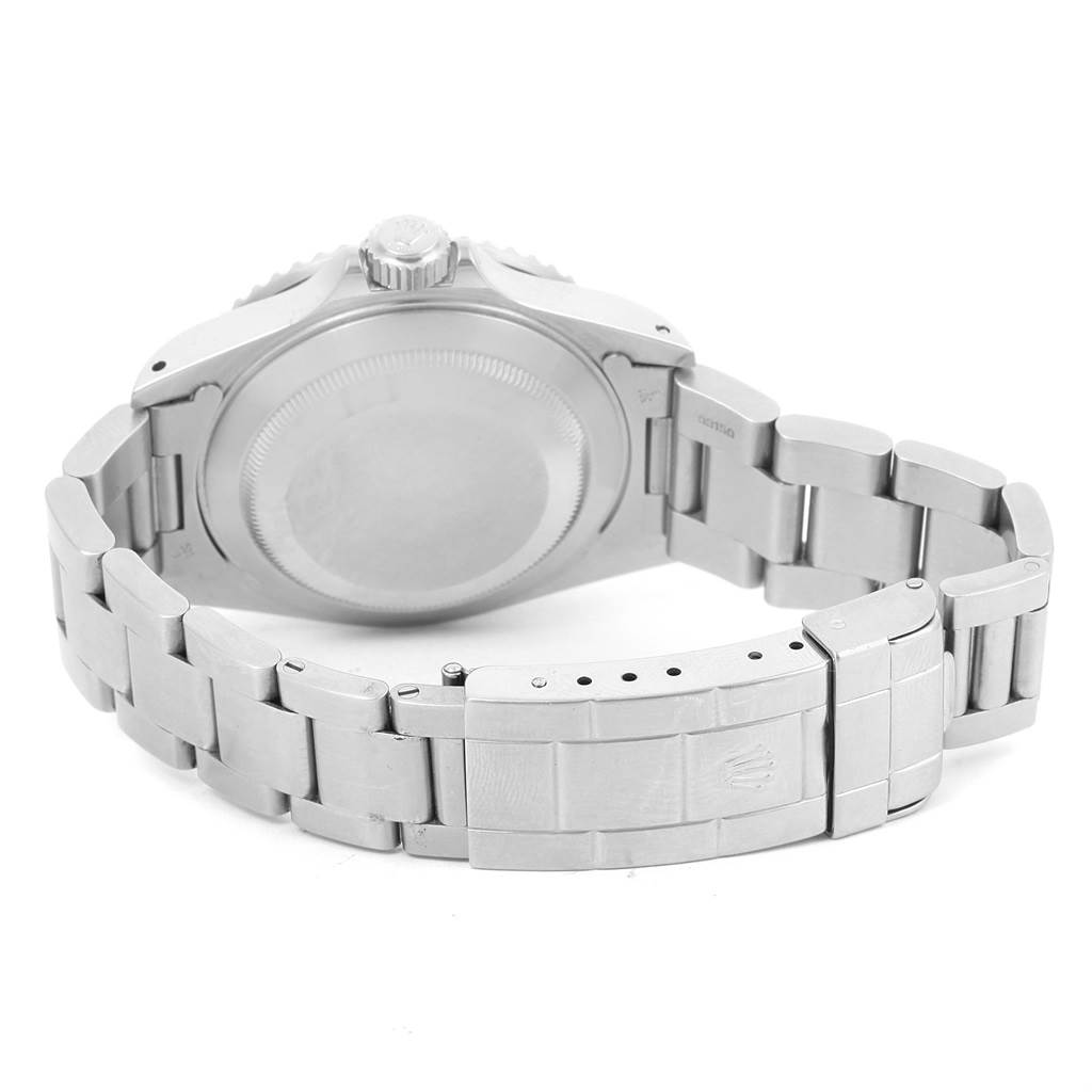 The image shows the back view of the Rolex Submariner 16610 Men
s Stainless Steel Black Dial 16610 Men
s Stainless Steel Black Dial watch, highlighting the case back and bracelet clasp.