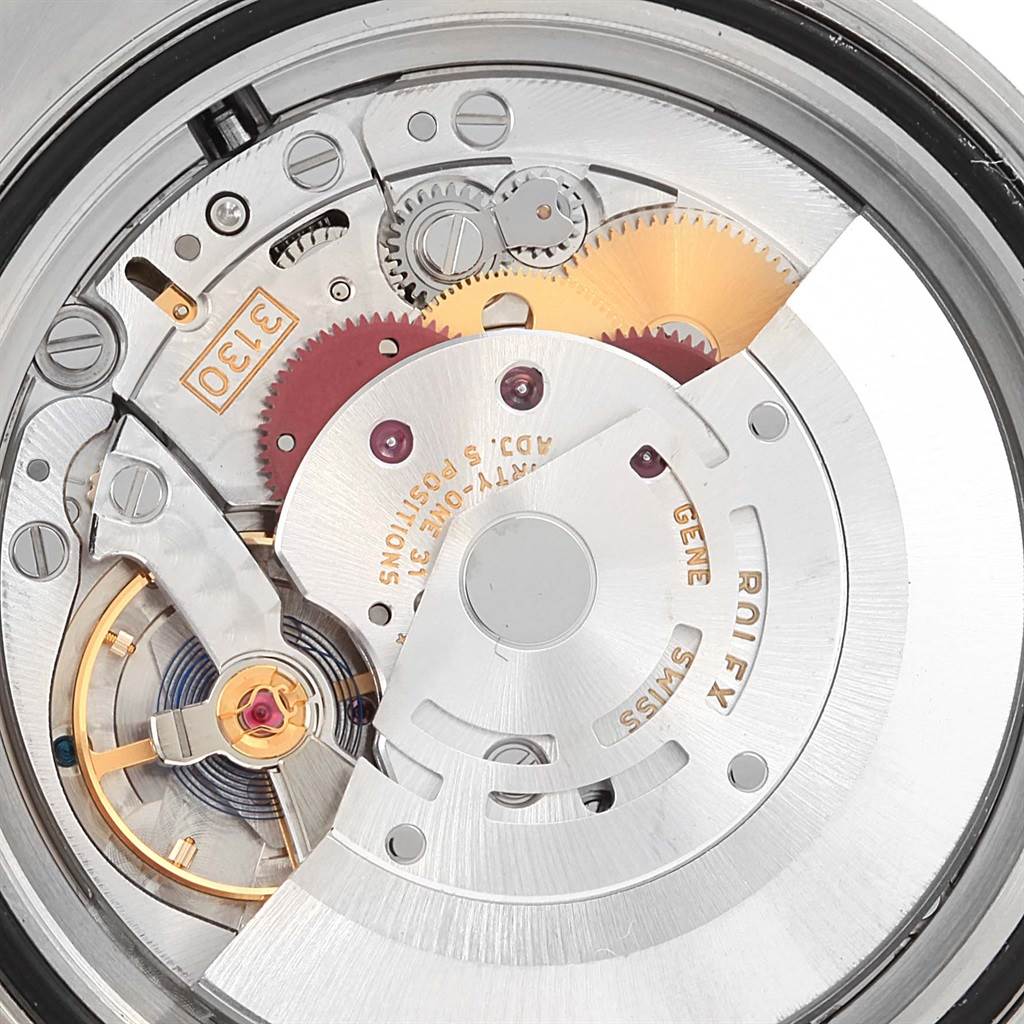 This is a close-up view of the internal mechanism of a Rolex Submariner 114060 Men
s Stainless Steel Black Dial 114060 Men
s Stainless Steel Black Dial watch, showcasing its intricate gears and components.