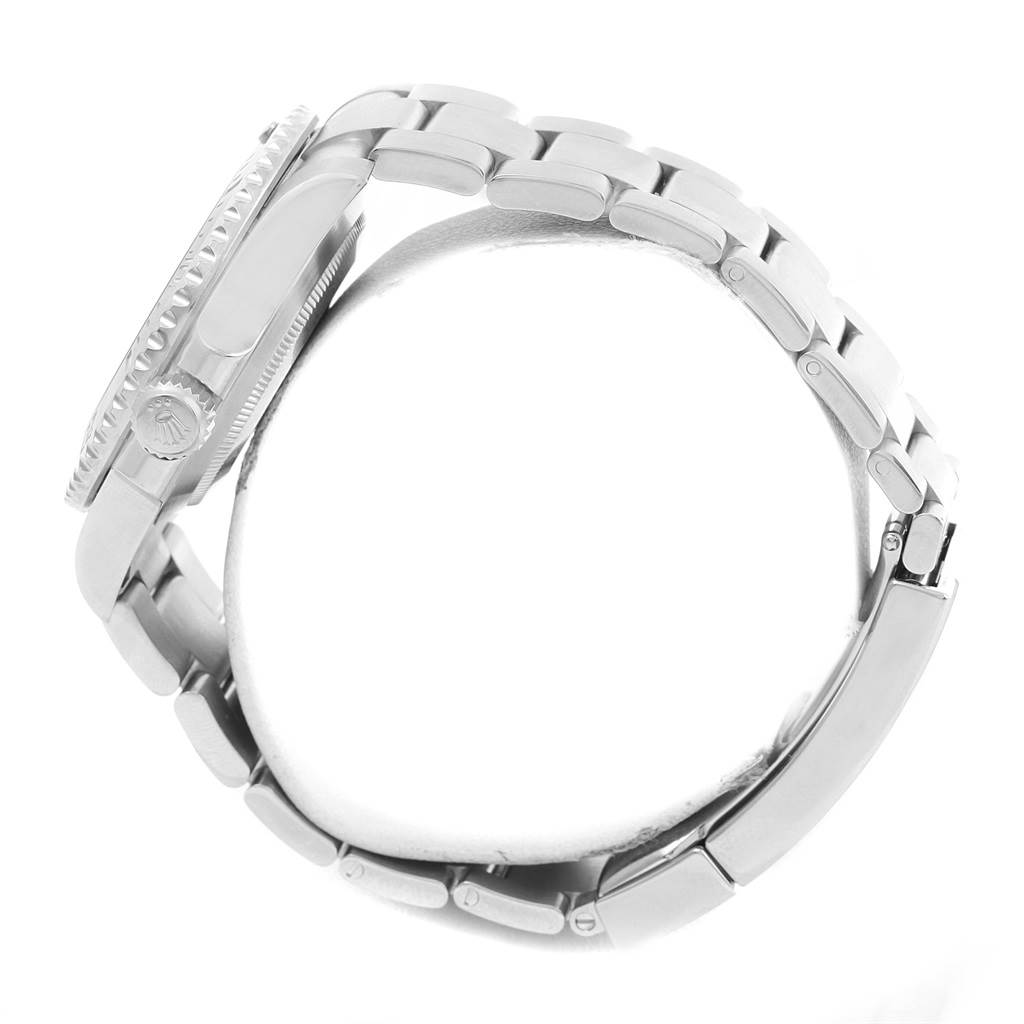 The image shows a side profile and bracelet of the Rolex Submariner 114060 Men
s Stainless Steel Black Dial 114060 Men
s Stainless Steel Black Dial watch, highlighting the crown, bezel, and links.