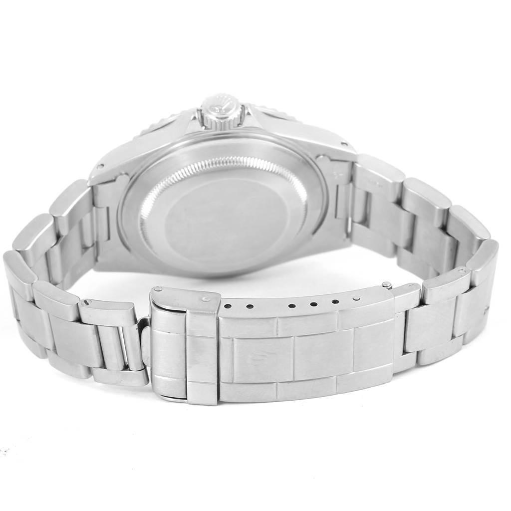 The image shows the back case and bracelet of a Rolex Submariner 14060 Men
s Stainless Steel Black Dial 14060 Men
s Stainless Steel Black Dial watch.