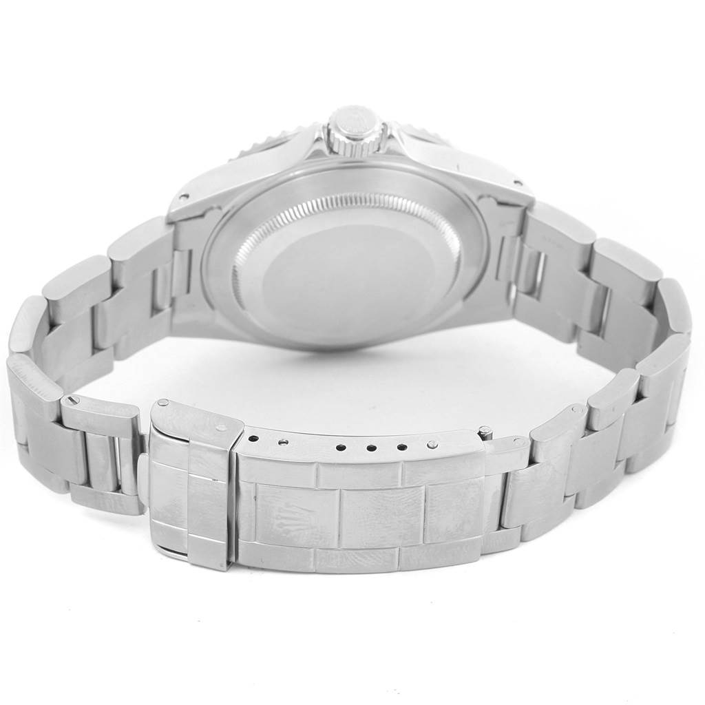 The image shows the back case and bracelet of a Rolex Submariner 14060 Men
s Stainless Steel Black Dial 14060 Men
s Stainless Steel Black Dial watch from a rear angle.