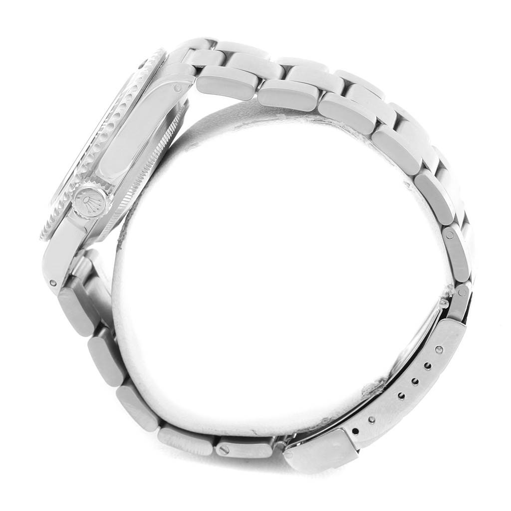 The image shows a side profile of the Rolex Submariner 14060 Men
s Stainless Steel Black Dial 14060 Men
s Stainless Steel Black Dial watch, highlighting the bracelet, crown, and case.