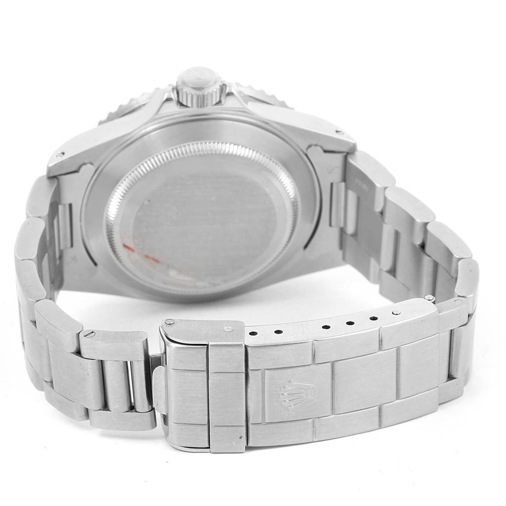 The image shows the back case and bracelet of a Rolex Submariner 16610 Men
s Stainless Steel Black Dial 16610 Men
s Stainless Steel Black Dial watch at a rear angle.