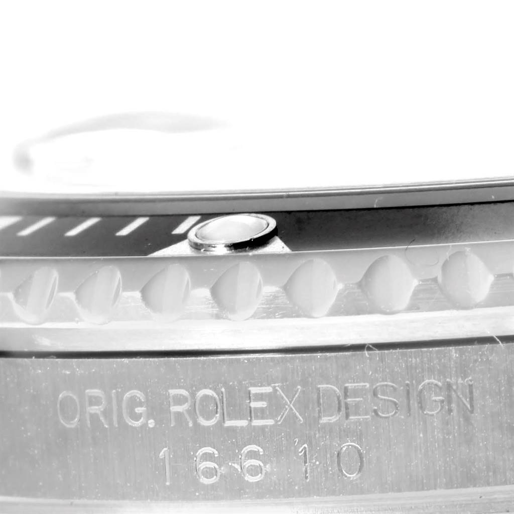 The image shows a close-up of the bezel and engraved case of a Rolex Submariner 16610 Men
s Stainless Steel Black Dial 16610 Men
s Stainless Steel Black Dial watch.