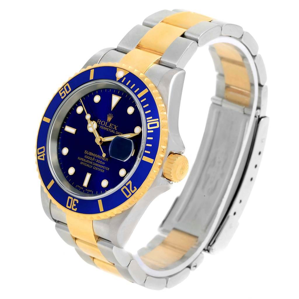 This Rolex Submariner 16613 Men's Steel and Gold (two tone) Blue Dial 16613 Men's Steel and Gold (two tone) Blue Dial model watch is shown at an angle highlighting the dial, bezel, crown, and bracelet.