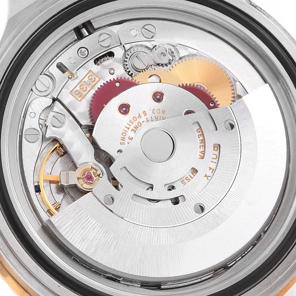 This image shows the internal mechanism of a Rolex Submariner 16613 Men's Steel and Gold (two tone) Blue Dial 16613 Men's Steel and Gold (two tone) Blue Dial watch, viewed from the back case.
