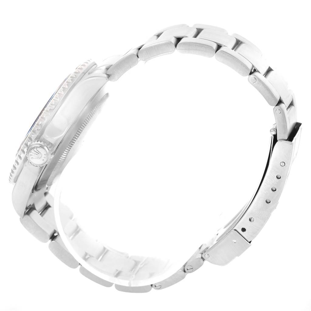 The image shows a side view of a Rolex Submariner 16610LV Men
s Stainless Steel Black Dial 16610LV Men
s Stainless Steel Black Dial watch, highlighting the bracelet, clasp, and crown.