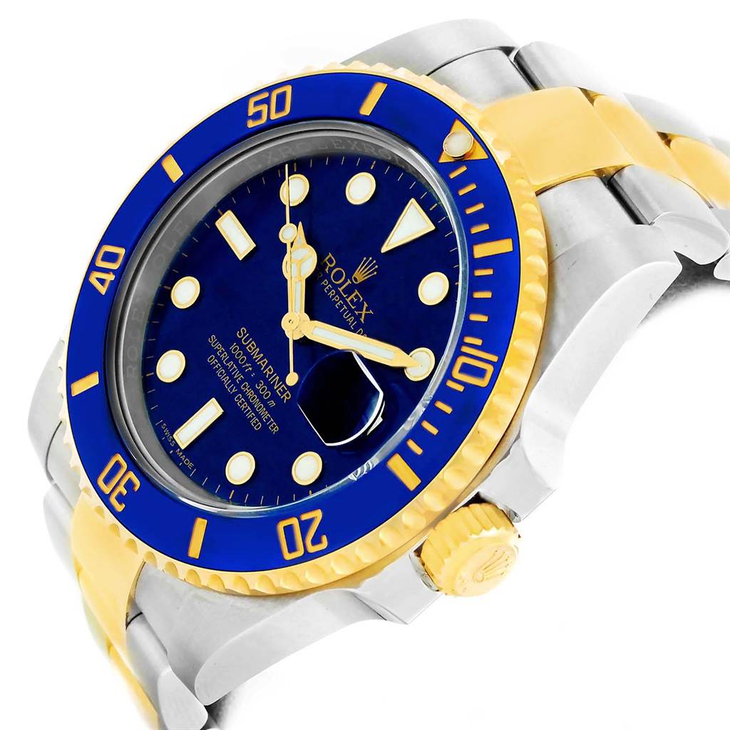 The image shows a Rolex Submariner 116613 Men's Steel and Gold (two tone) Blue Dial 116613 Men's Steel and Gold (two tone) Blue Dial watch from an angled view, highlighting its blue and yellow bezel, dial, and part of the bracelet.