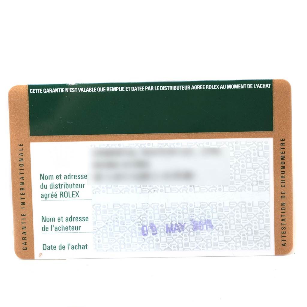 The image shows an international guarantee card for a Rolex Submariner 116613 Men
s Steel and Gold (two tone) Black Dial 116613 Men
s Steel and Gold (two tone) Black Dial watch, displaying purchase details and dealer information.