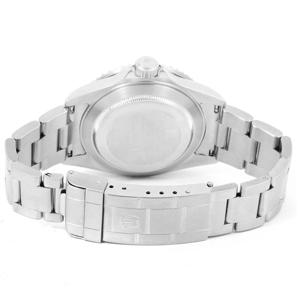 This image shows the back, clasp, and bracelet of a Rolex Submariner 16610 Men
s Stainless Steel Black Dial 16610 Men
s Stainless Steel Black Dial watch laid out flat.