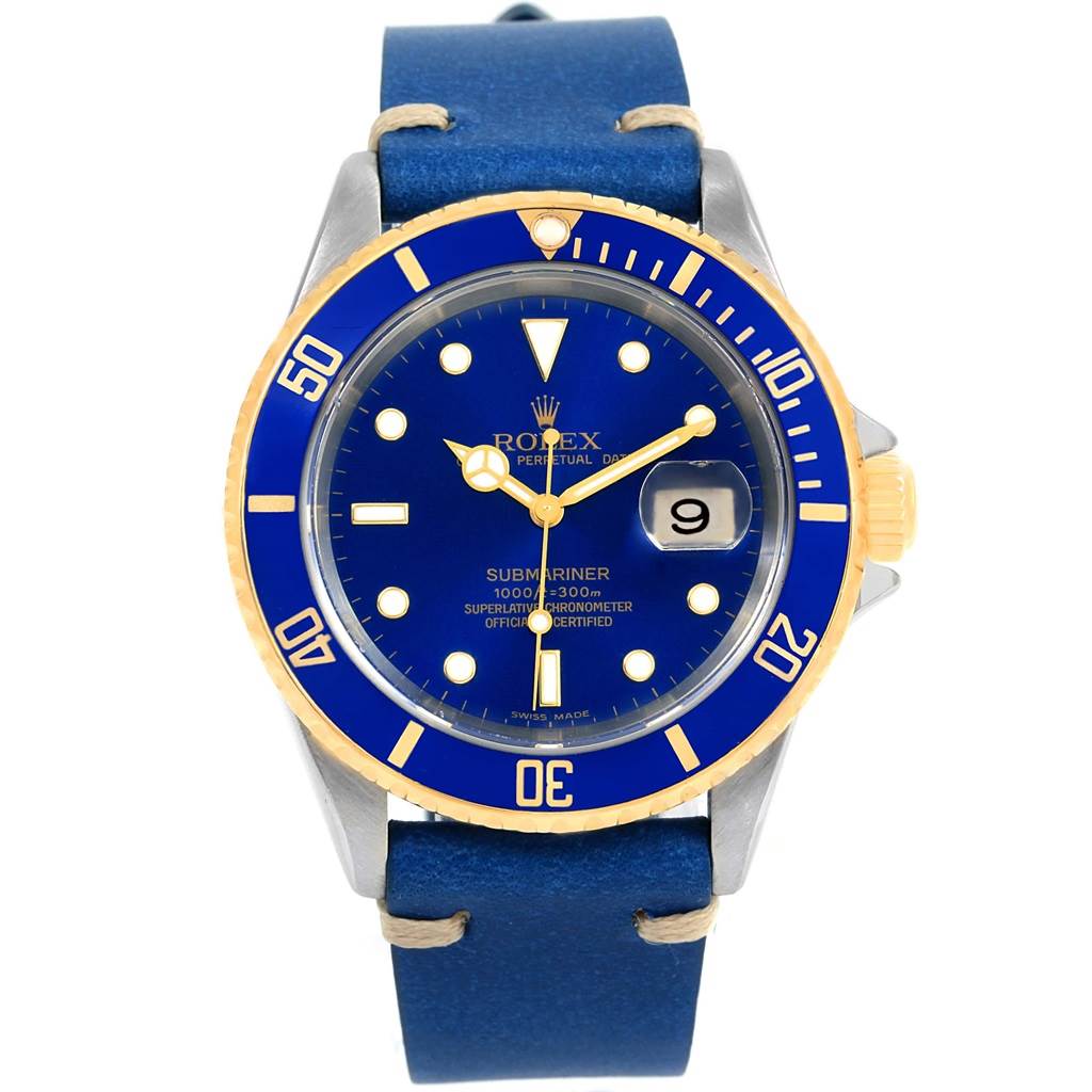 This Rolex Submariner 16613 Men
s Steel and Gold (two tone) Blue Dial 16613 Men
s Steel and Gold (two tone) Blue Dial watch is shown from the front, displaying the dial, bezel, and blue leather strap.