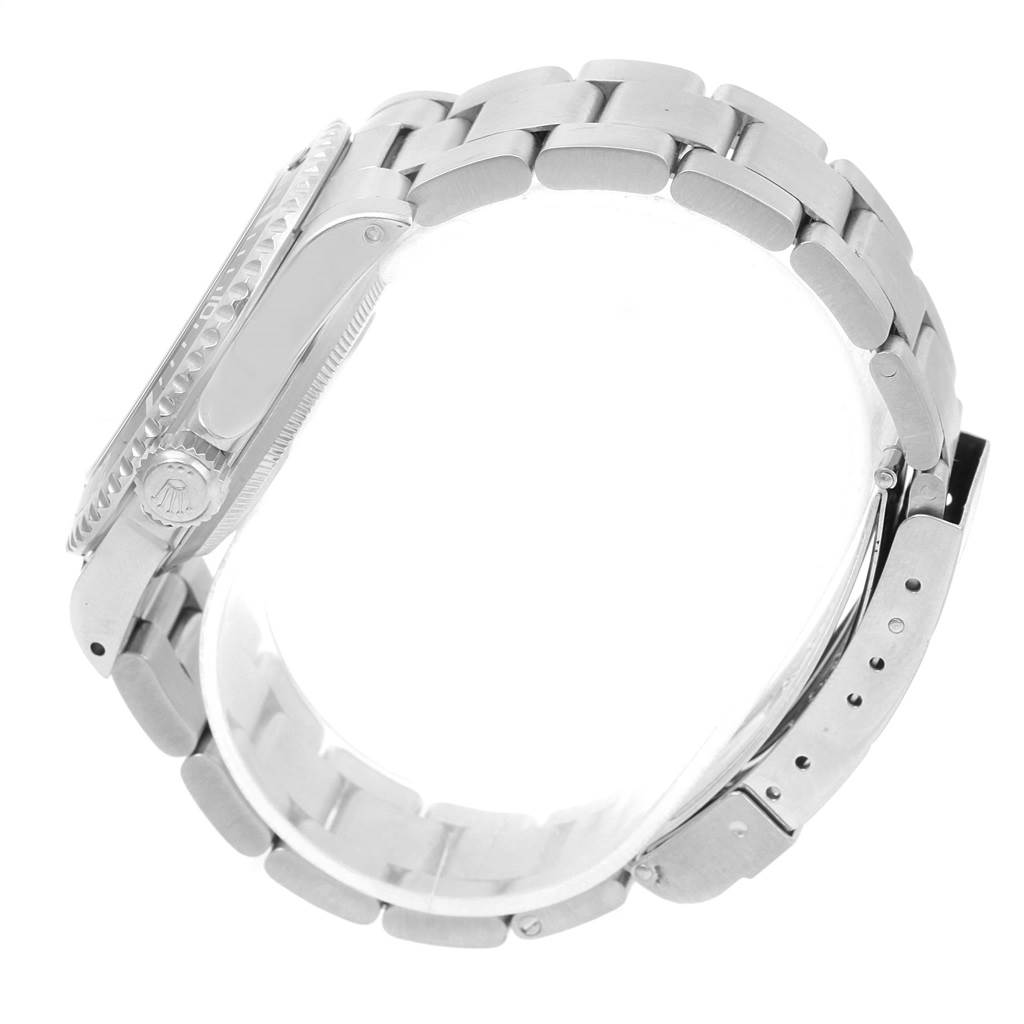 This image shows a side view of the Rolex Submariner 14060 Men's Stainless Steel Black Dial 14060 Men's Stainless Steel Black Dial watch, highlighting the bracelet and clasp.