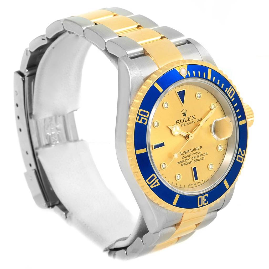 This angle shows the Rolex Submariner 16613 Men
s Steel and Gold (two tone) Champagne Dial 16613 Men
s Steel and Gold (two tone) Champagne Dial watch from a front-left perspective, highlighting its face, bezel, and two-tone bracelet.