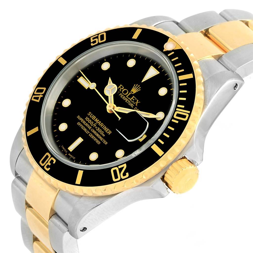 This image shows a Rolex Submariner 16613 Men
s Steel and Gold (two tone) Black Dial 16613 Men
s Steel and Gold (two tone) Black Dial watch at an oblique angle, highlighting the dial, bezel, crown, and part of the bracelet.