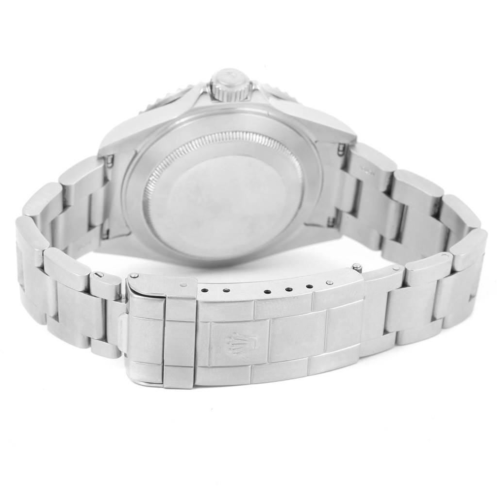 The image shows the back view of a Rolex Submariner 16610 Men's Stainless Steel Black Dial 16610 Men's Stainless Steel Black Dial watch, highlighting the case back and the bracelet with the clasp.