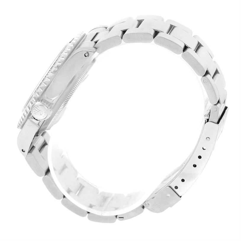 The image shows a side view of the Rolex Submariner 14060 Men's Stainless Steel Black Dial 14060 Men's Stainless Steel Black Dial watch, highlighting its case, crown, and stainless steel bracelet.