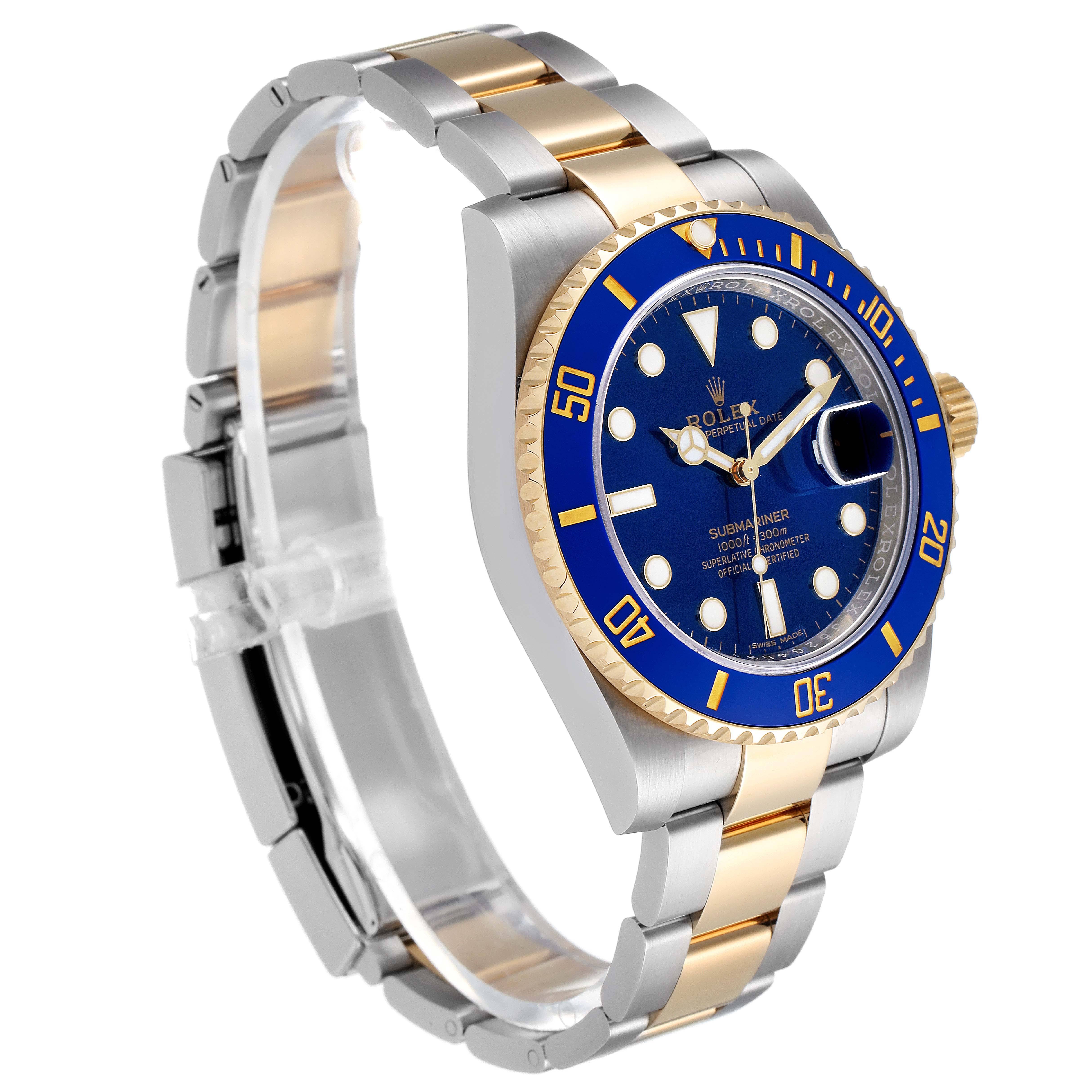This image shows a side angle of the Rolex Submariner 116613 Men's Steel and Gold (two tone) Blue Dial 116613 Men's Steel and Gold (two tone) Blue Dial watch, highlighting its blue dial, bezel, and two-tone bracelet.