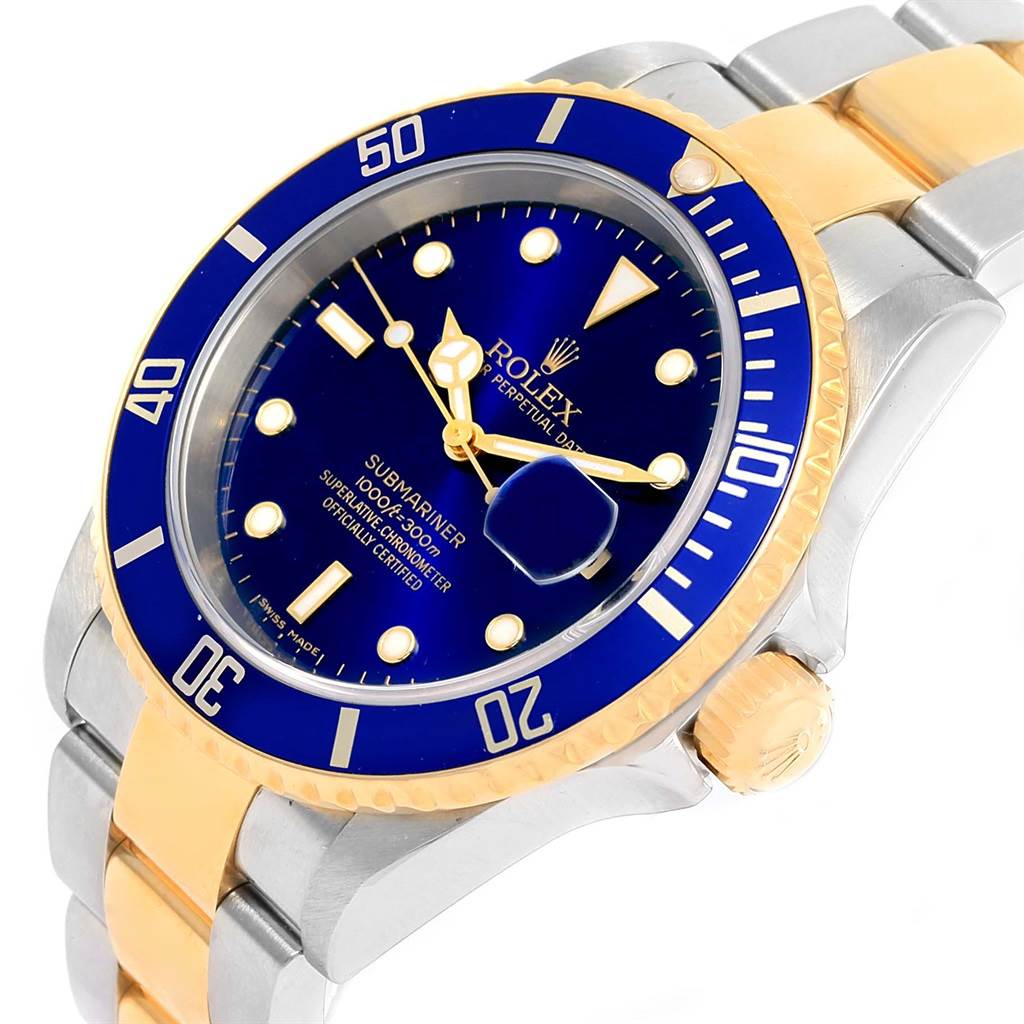 The Rolex Submariner 16613 Men's Steel and Gold (two tone) Blue Dial 16613 Men's Steel and Gold (two tone) Blue Dial watch is shown at a slight angle, displaying the face, bezel, and part of the bracelet.