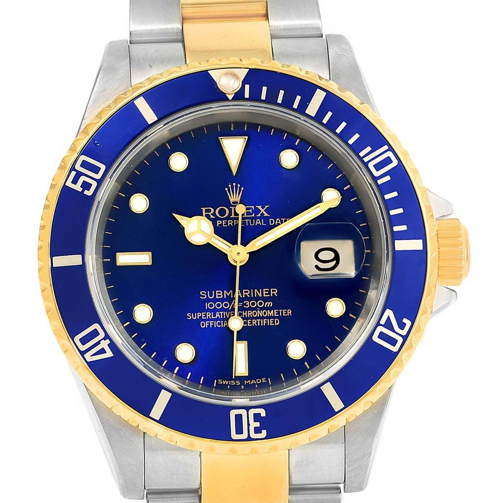 The Rolex Submariner 16613 Men's Steel and Gold (two tone) Blue Dial 16613 Men's Steel and Gold (two tone) Blue Dial watch is shown from a top-down angle, highlighting its dial, bezel, and bracelet.