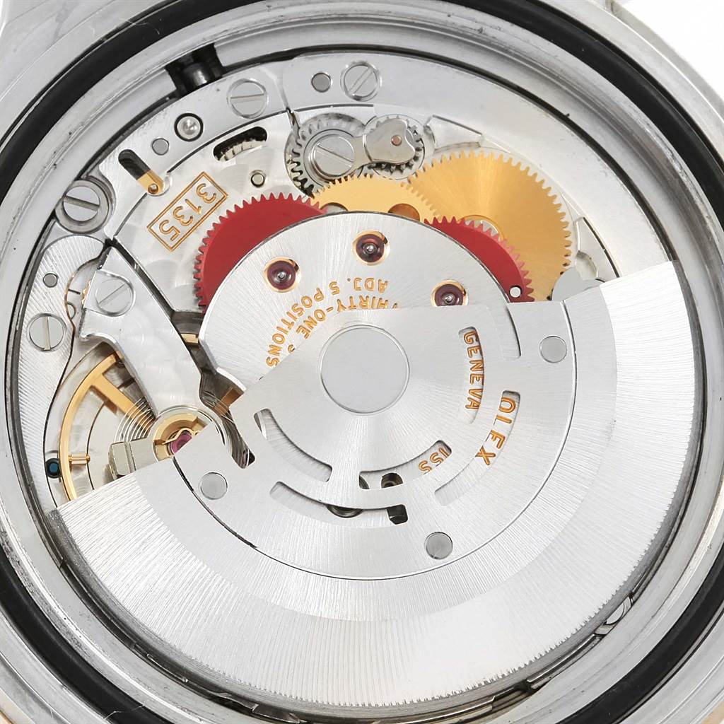 The image shows the internal movement mechanism of a Rolex Submariner 16613 Men's Steel and Gold (two tone) Blue Dial 16613 Men's Steel and Gold (two tone) Blue Dial watch from a top-down angle.