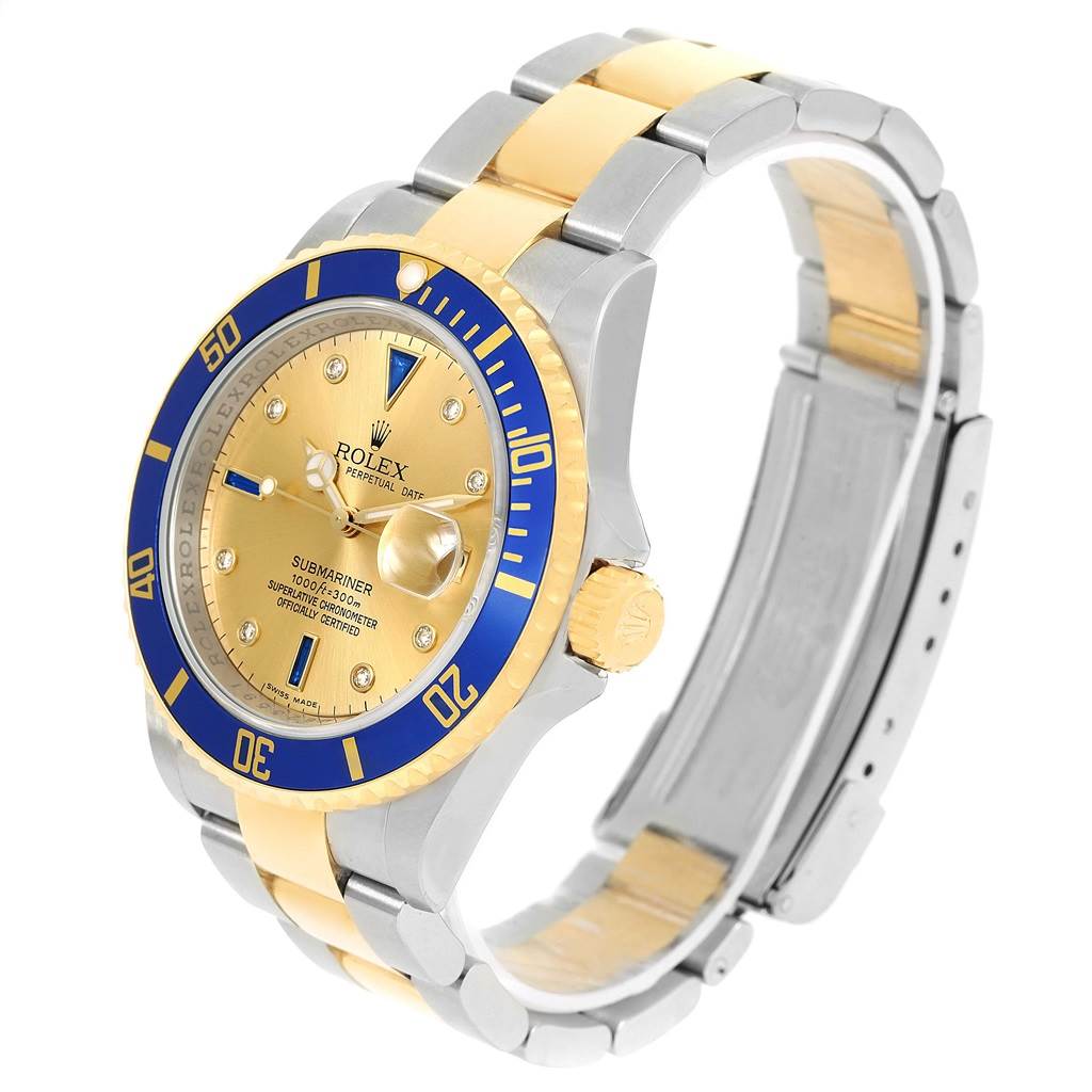 The image shows a three-quarter view of the Rolex Submariner 16613 Men's Steel and Gold (two tone) Champagne Dial 16613 Men's Steel and Gold (two tone) Champagne Dial watch, highlighting the dial, bezel, crown, and bracelet.