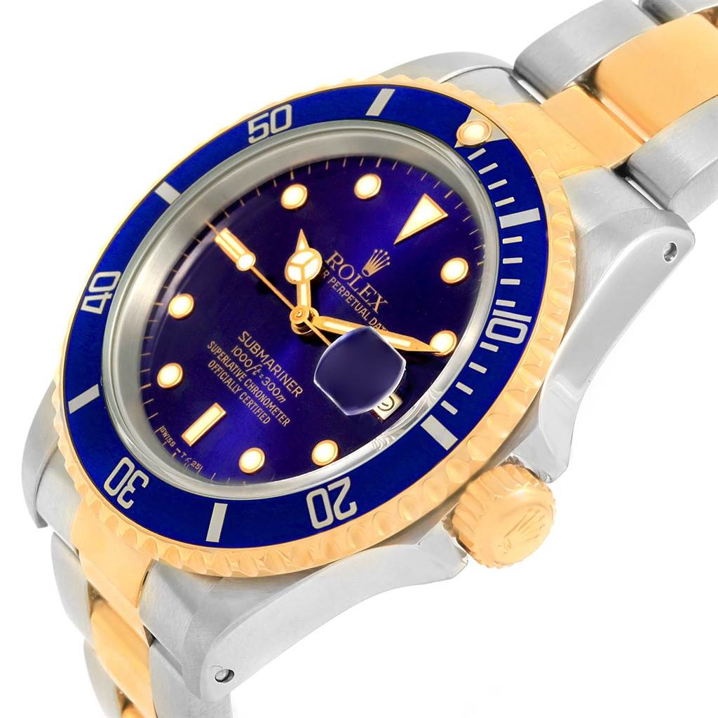 This image shows a close-up, angled view of a Rolex Submariner 16613 Men's Steel and Gold (two tone) Blue Dial 16613 Men's Steel and Gold (two tone) Blue Dial watch, highlighting the dial, bezel, and part of the bracelet.