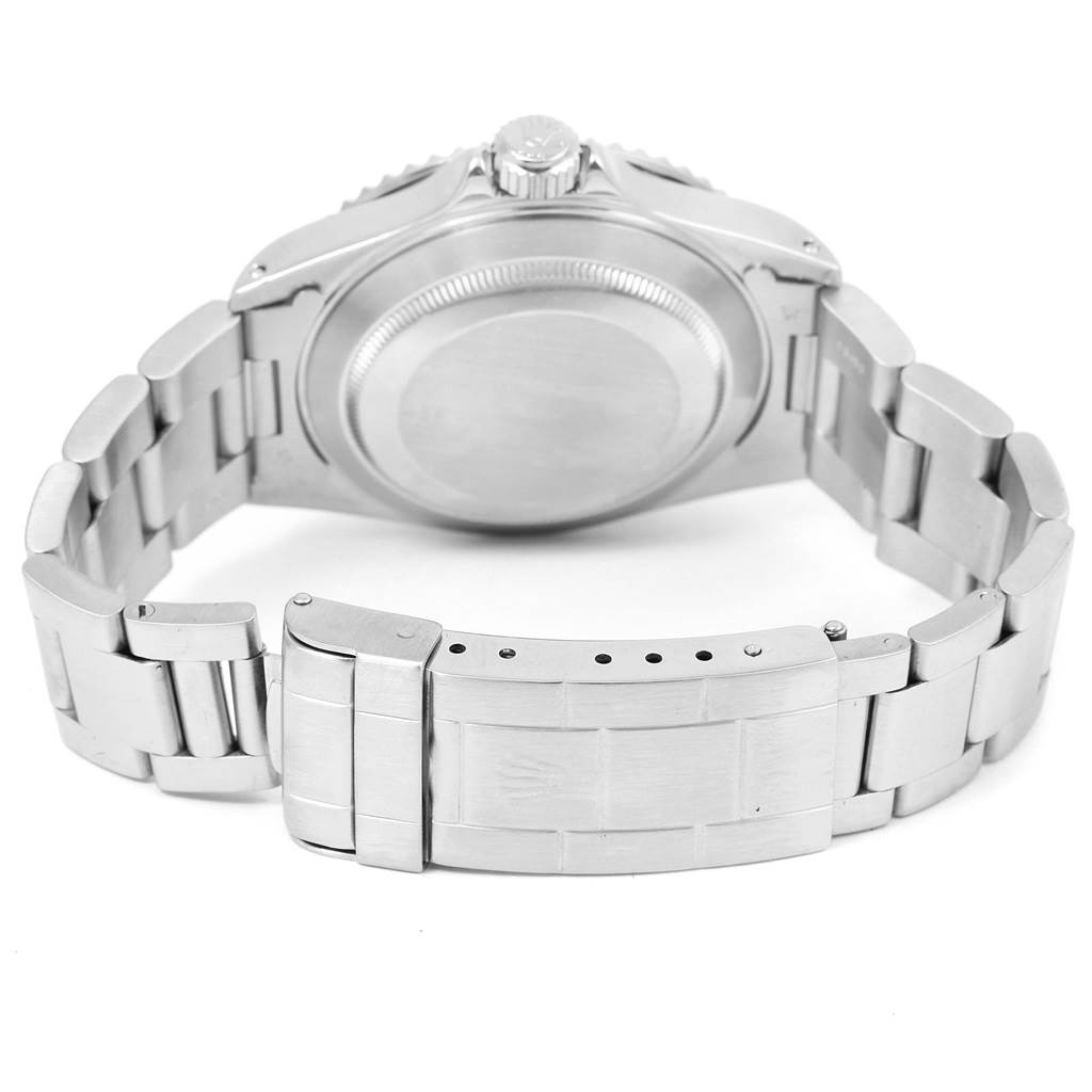 The image shows the back side and bracelet clasp of a Rolex Submariner 14060 Men's Stainless Steel Black Dial 14060 Men's Stainless Steel Black Dial watch.