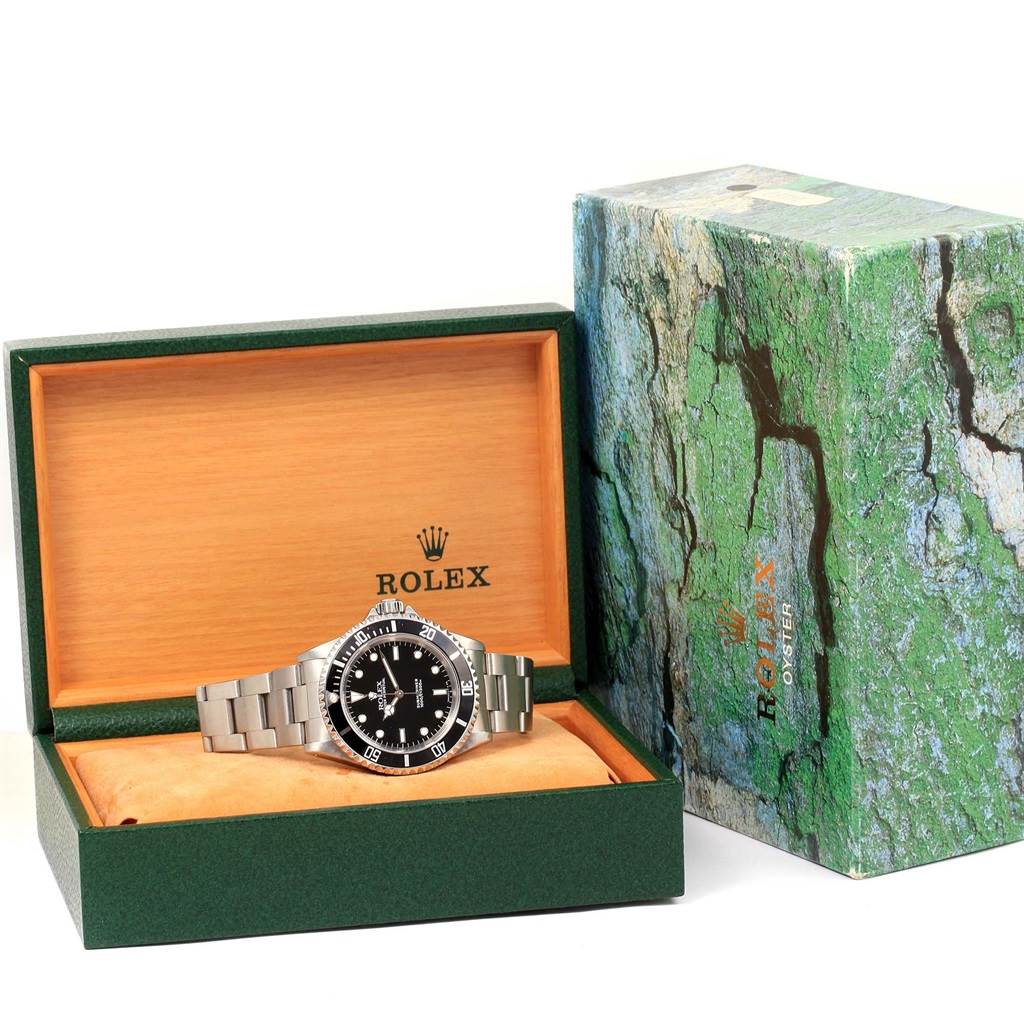 The image shows a Rolex Submariner 14060 Men's Stainless Steel Black Dial 14060 Men's Stainless Steel Black Dial watch in an open box, with its packaging also visible.