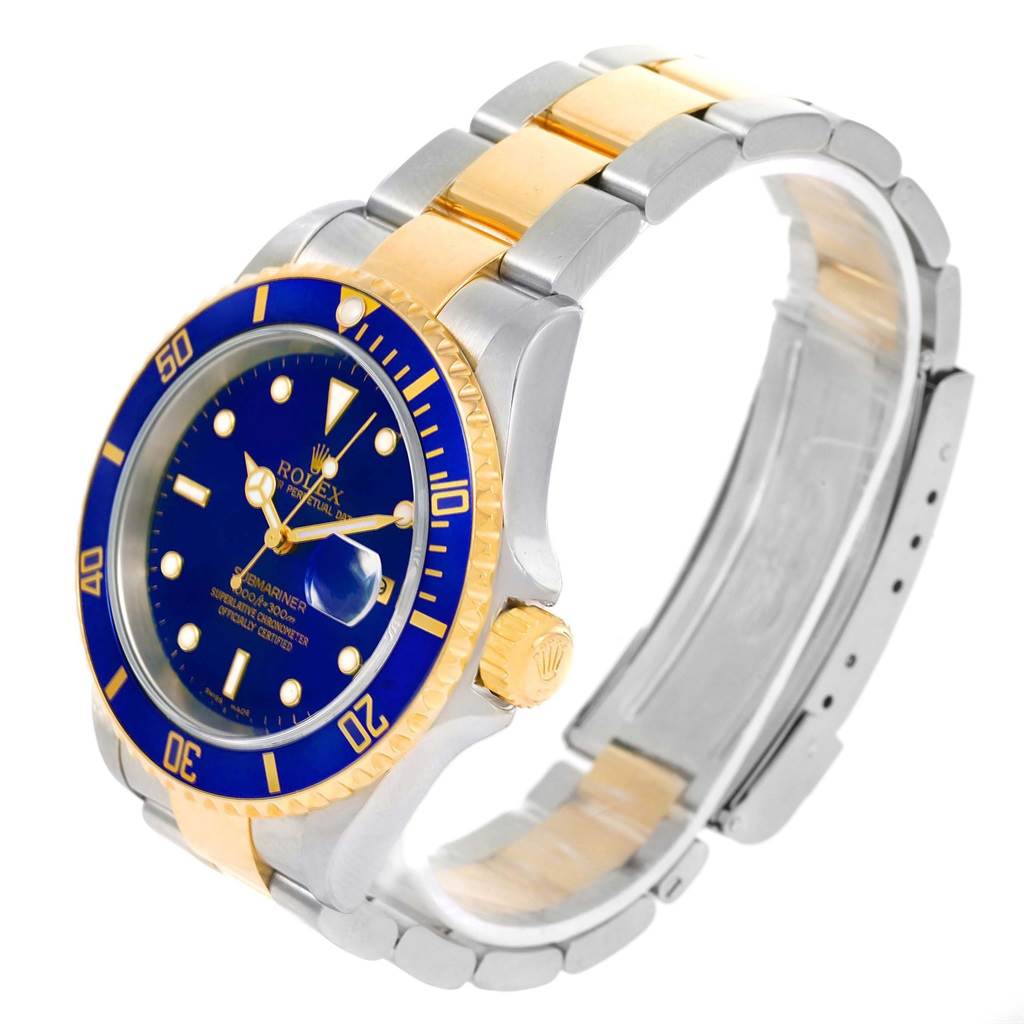 The image shows a Rolex Submariner 16613 Men's Steel and Gold (two tone) Blue Dial 16613 Men's Steel and Gold (two tone) Blue Dial watch from a three-quarter angle, highlighting the bezel, dial, crown, and bracelet.