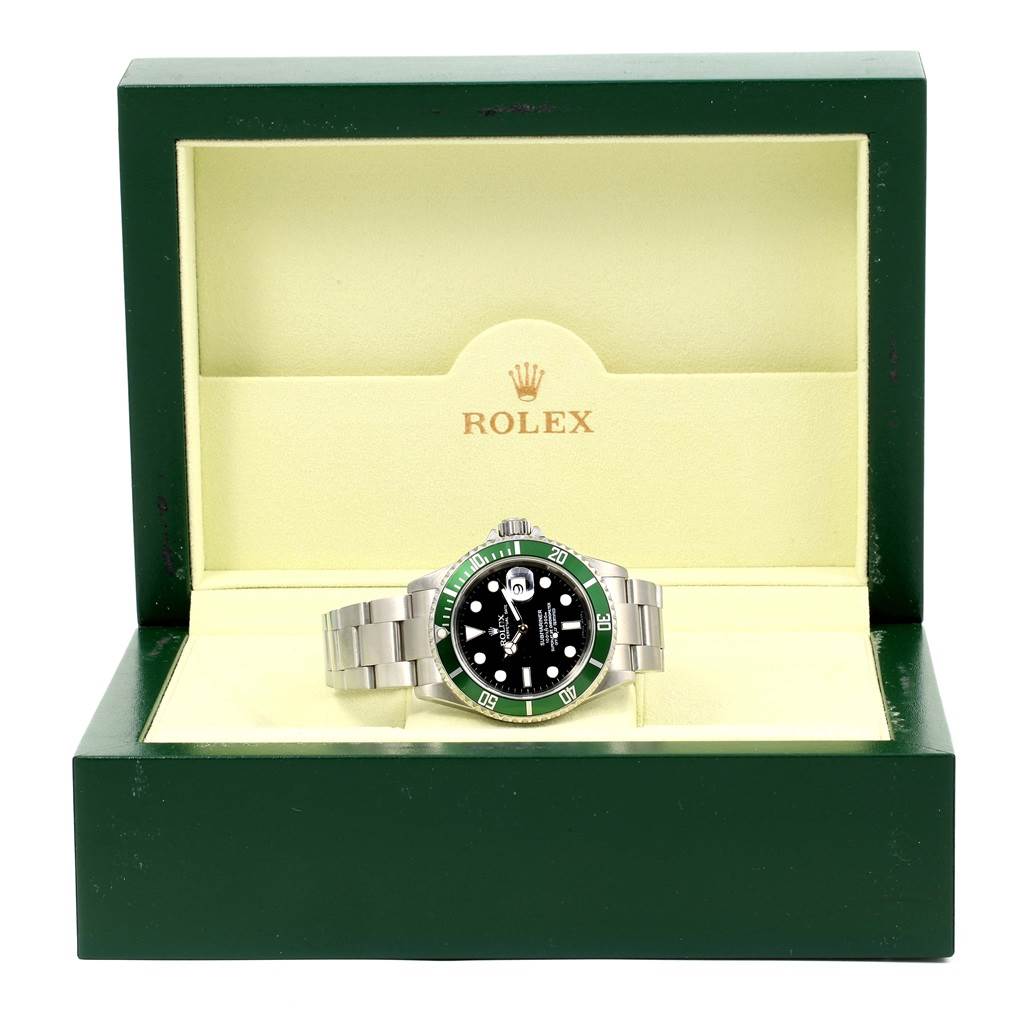 The image shows the Rolex Submariner 16610LV Men's Stainless Steel Black Dial 16610LV Men's Stainless Steel Black Dial watch displayed in its green and cream presentation box, front view.