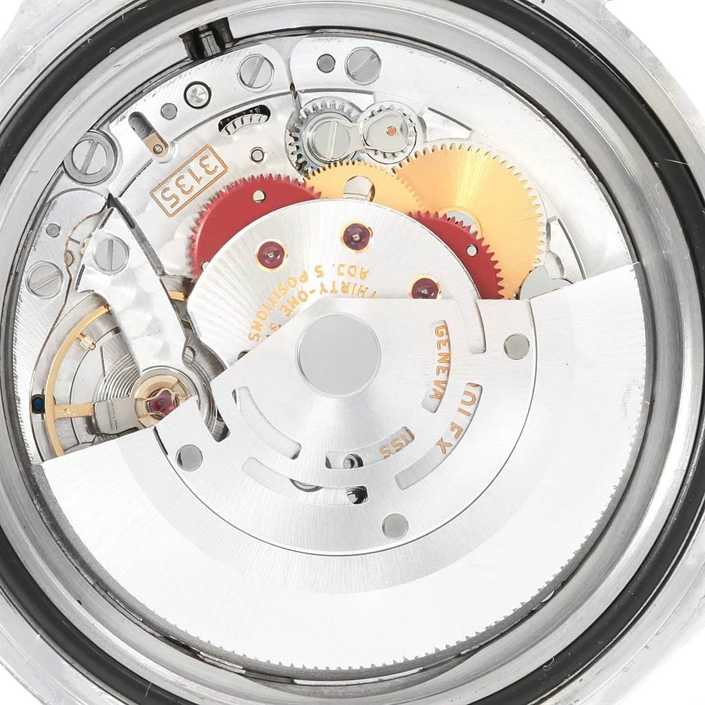 This image shows the internal mechanical movement of a Rolex Submariner 16610LV Men's Stainless Steel Black Dial 16610LV Men's Stainless Steel Black Dial watch from a close-up, angled top view.