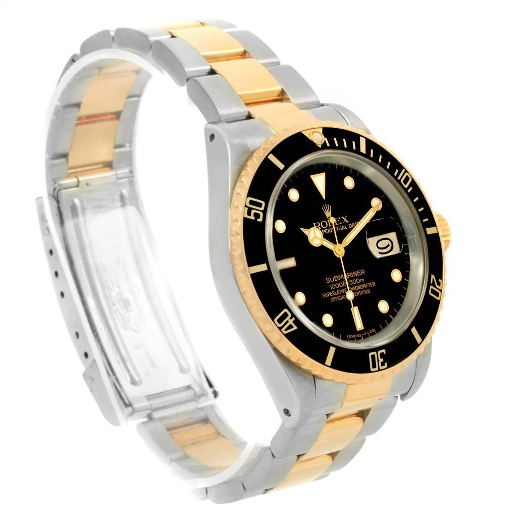 The image shows a Rolex Submariner 16613 Men
s Steel and Gold (two tone) Black Dial 16613 Men
s Steel and Gold (two tone) Black Dial watch from a side angle, highlighting the dial, bezel, and partly the bracelet.