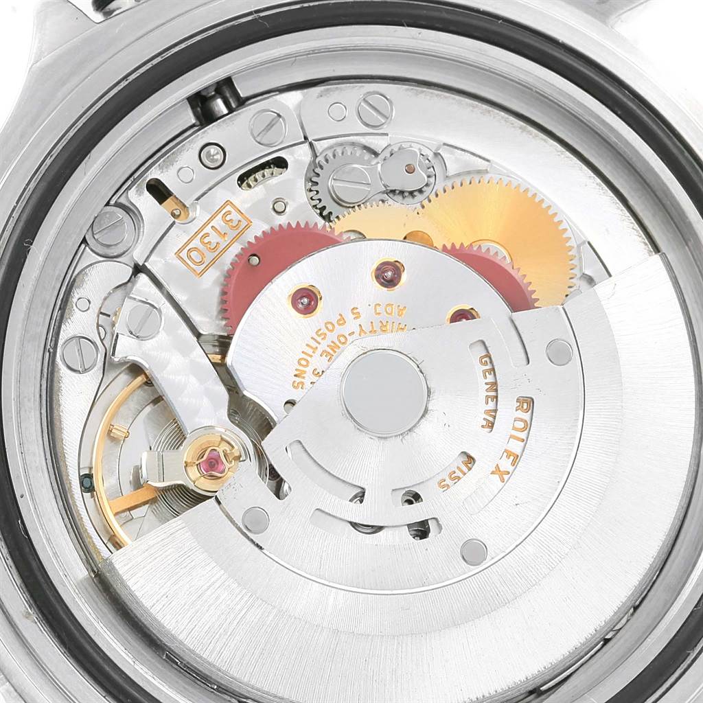 This image shows the internal automatic movement mechanism of a Rolex Submariner 14060 Men's Stainless Steel Black Dial 14060 Men's Stainless Steel Black Dial watch from a back angle.