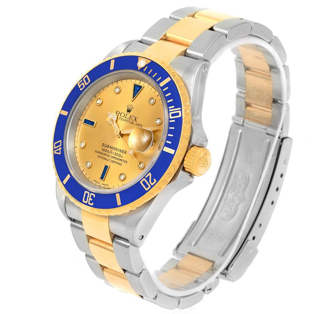 The Rolex Submariner 16613 Men
s Steel and Gold (two tone) Champagne Dial 16613 Men
s Steel and Gold (two tone) Champagne Dial watch is shown at a three-quarter angle, highlighting its face, bezel, band, and clasp.