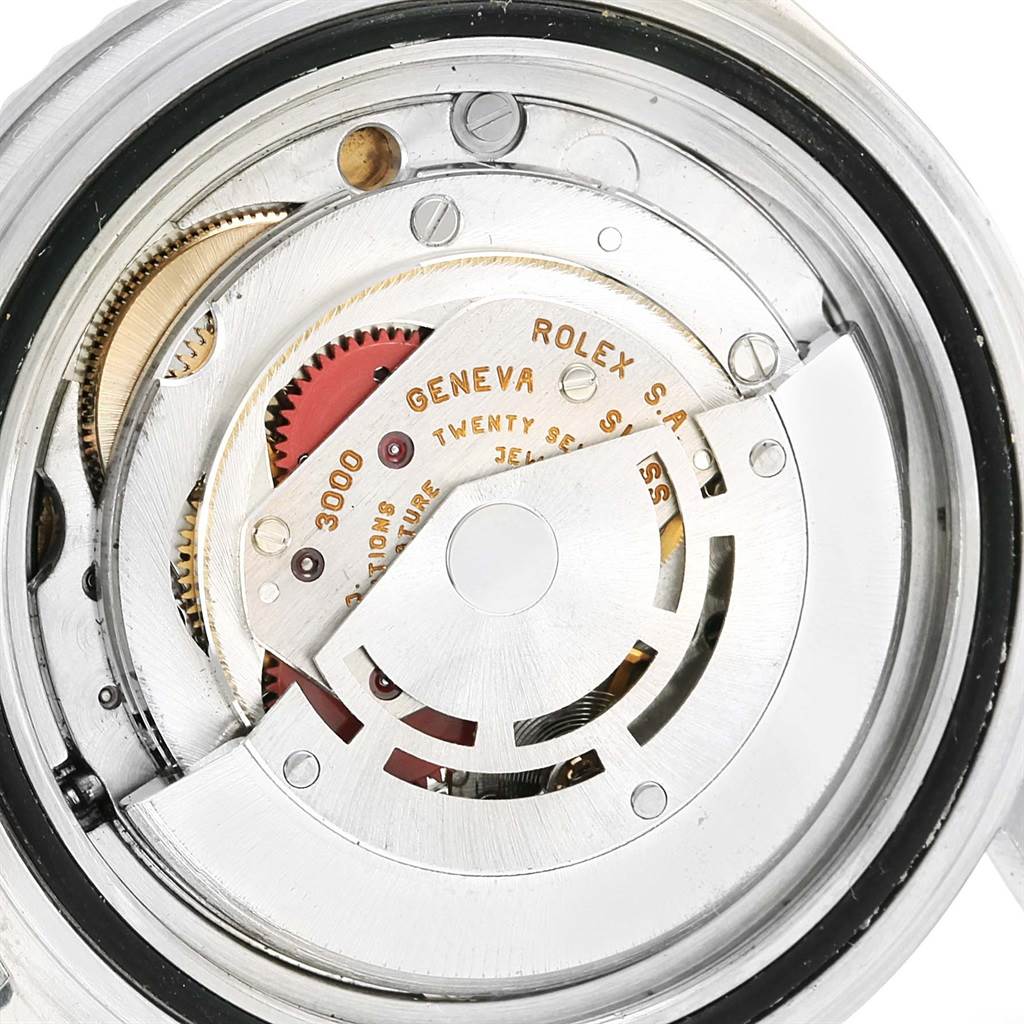 The image shows the movement mechanism of a Rolex Submariner 14060 Men
s Stainless Steel Black Dial 14060 Men
s Stainless Steel Black Dial watch, viewed from the back.